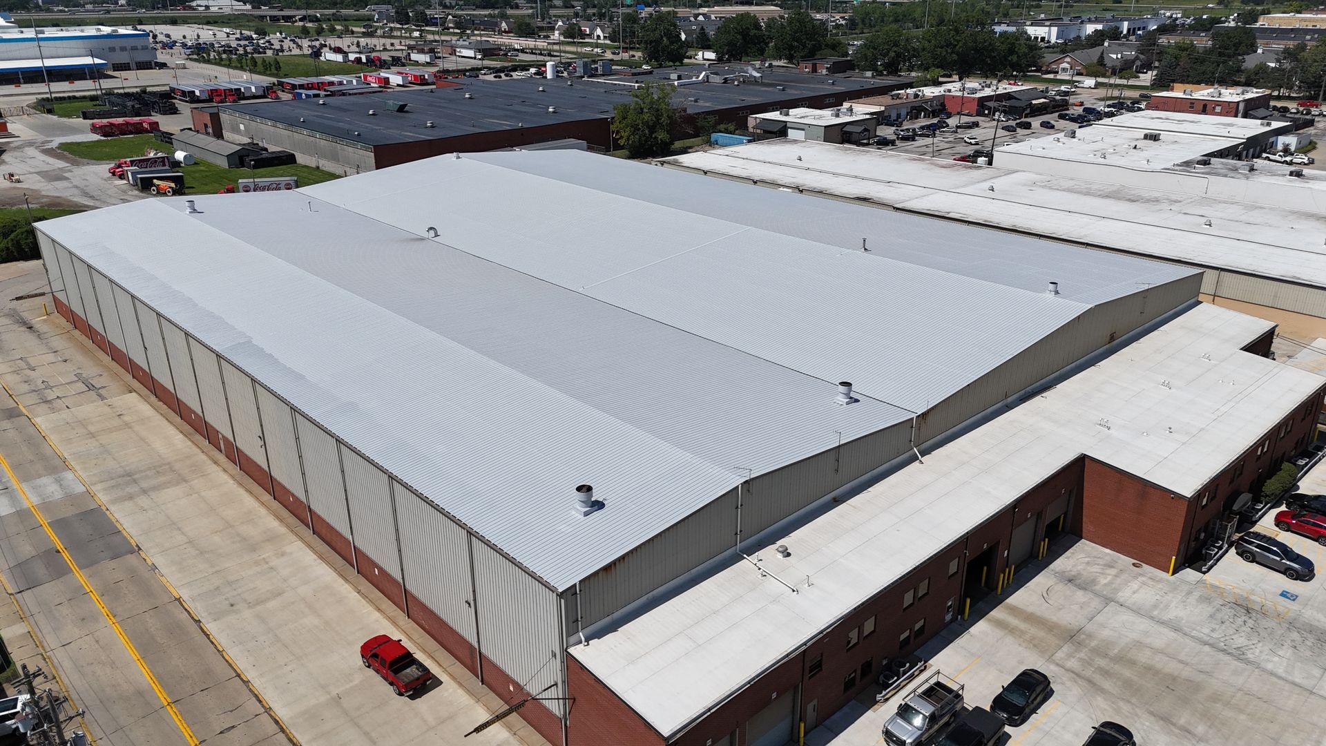 Finished commercial roofing project in Bedford, Ohio. Silicone coating over an existing metal roof. Completed at Olympic Steel in August 2026.