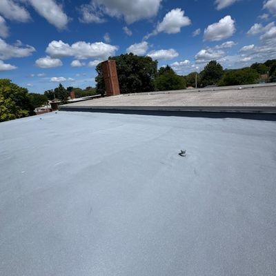 Finished silicone coating over an existing spray foam roof in Cleveland, Ohio. The job was at Archbishop Lyke Kindergarten.