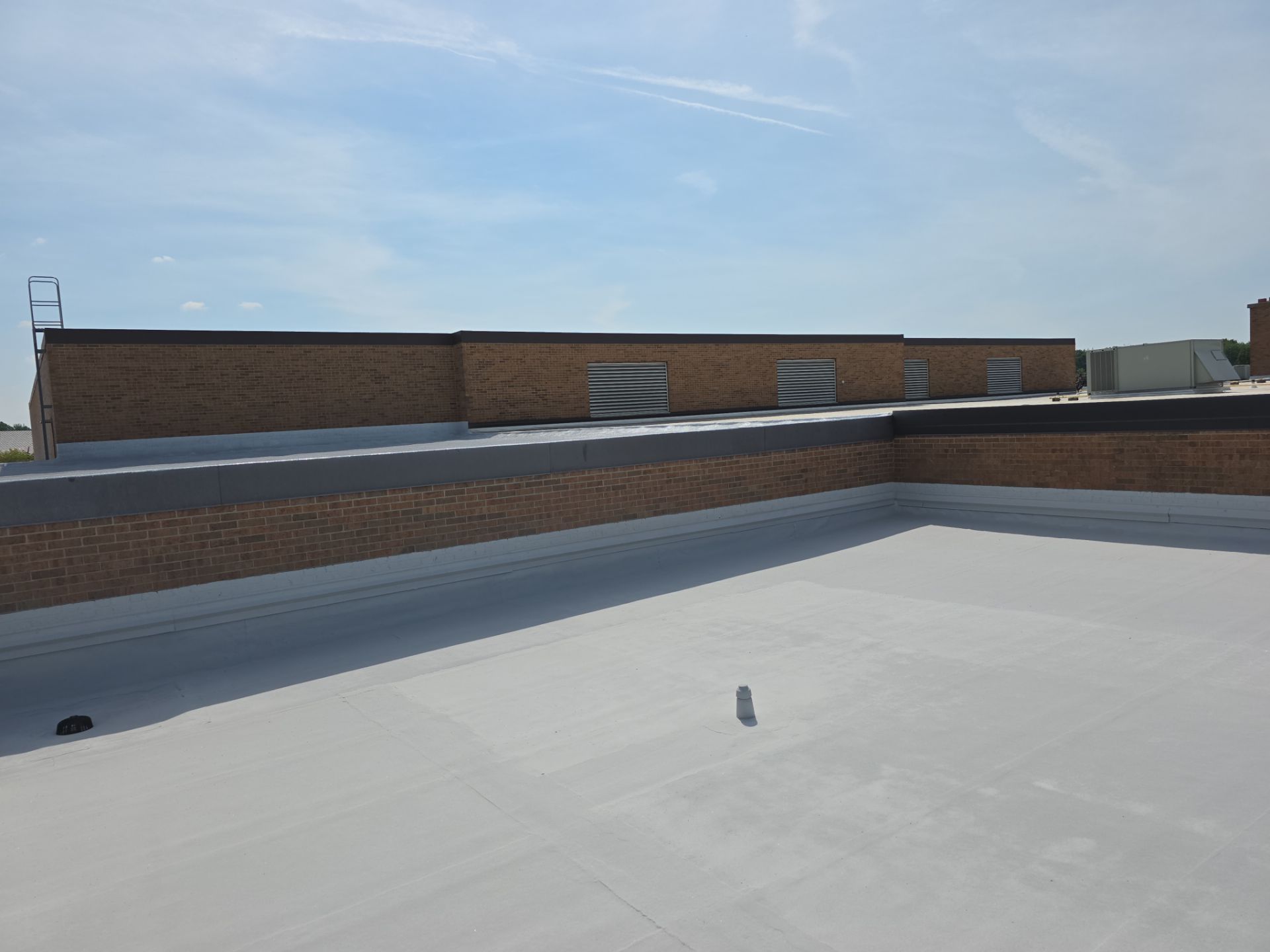 finished spray foam roofing section of Buckeye High School's new roof in Medina, Ohio