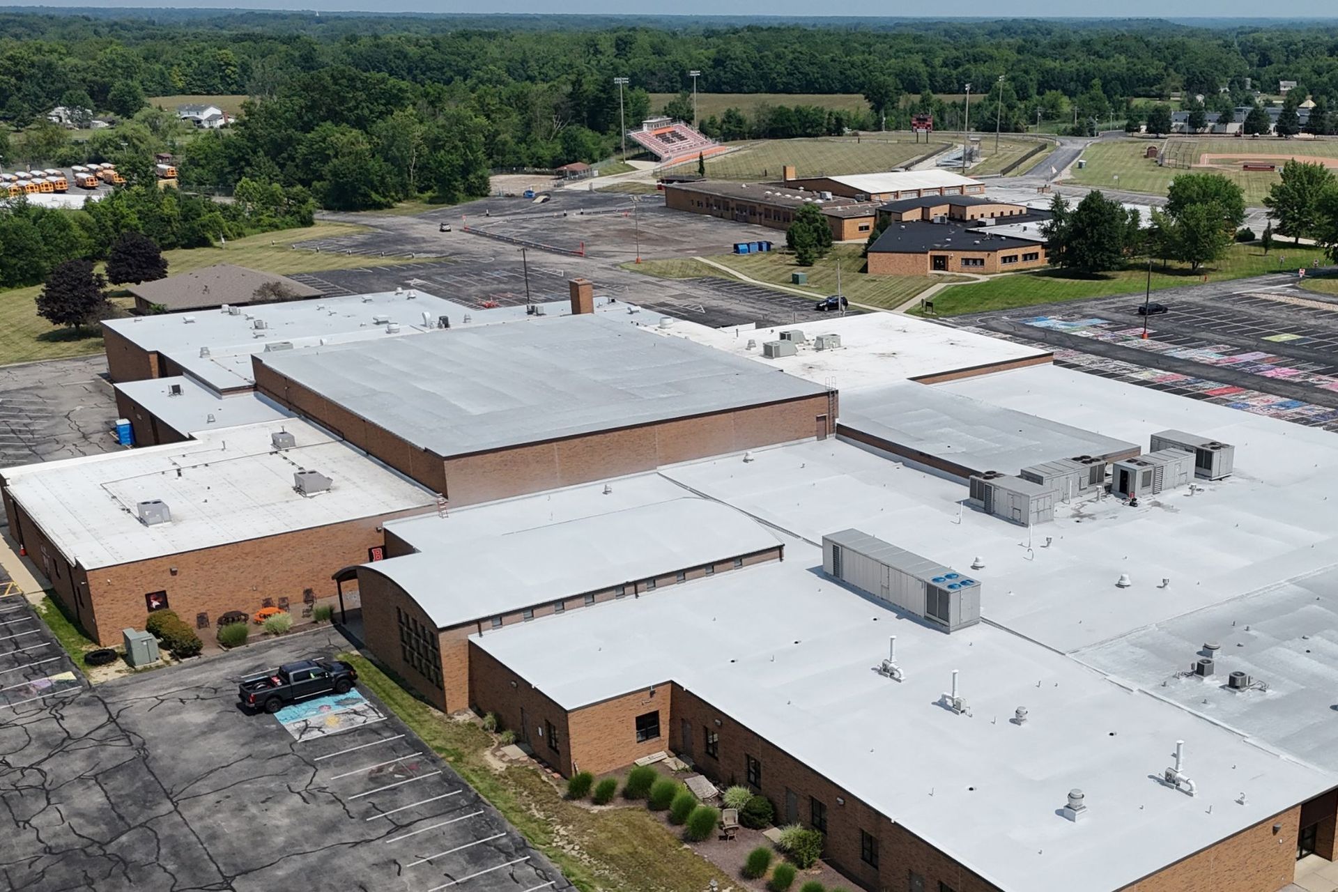 spray foam roof installed over an existing torch down roof at Buckeye High School in Medina, Ohio