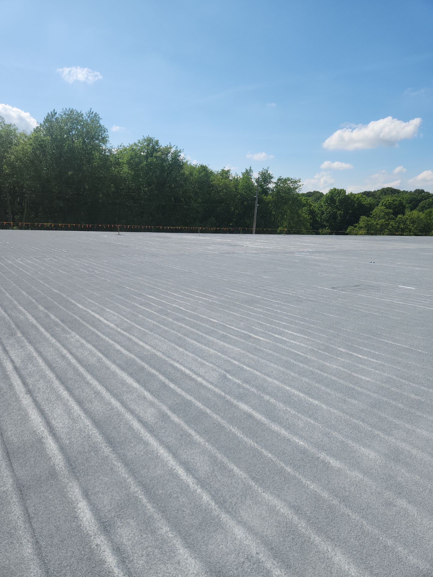 metal roof with spray foam over it