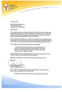 Ronald McDonald House letter on white paper with yellow header and blue footer, signed at the bottom.