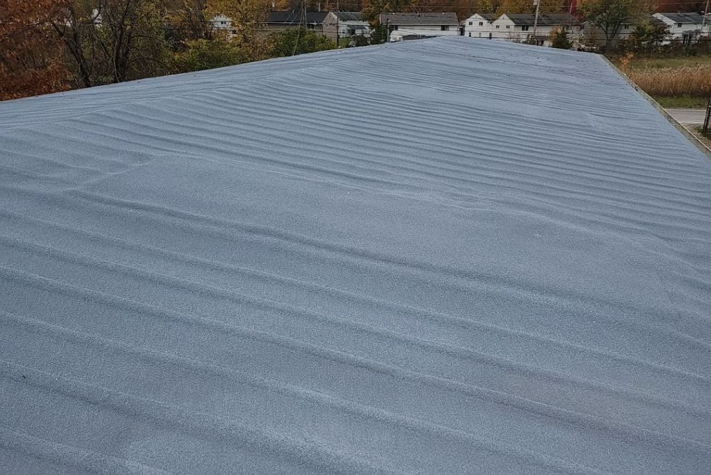 spray foam over an existing metal roof