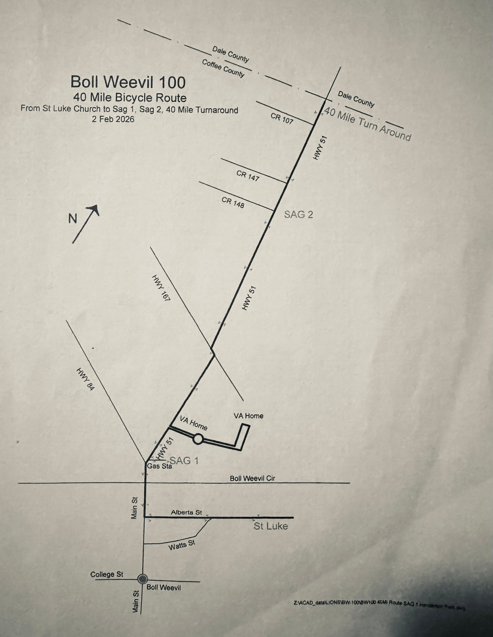 Survey/plan drawing with diagonal boundary lines, measurements, labels, and a north arrow on a white page