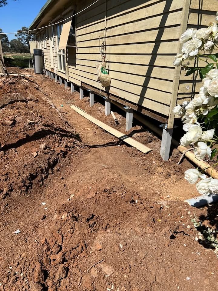 A house being restumped with new concrete stumps.