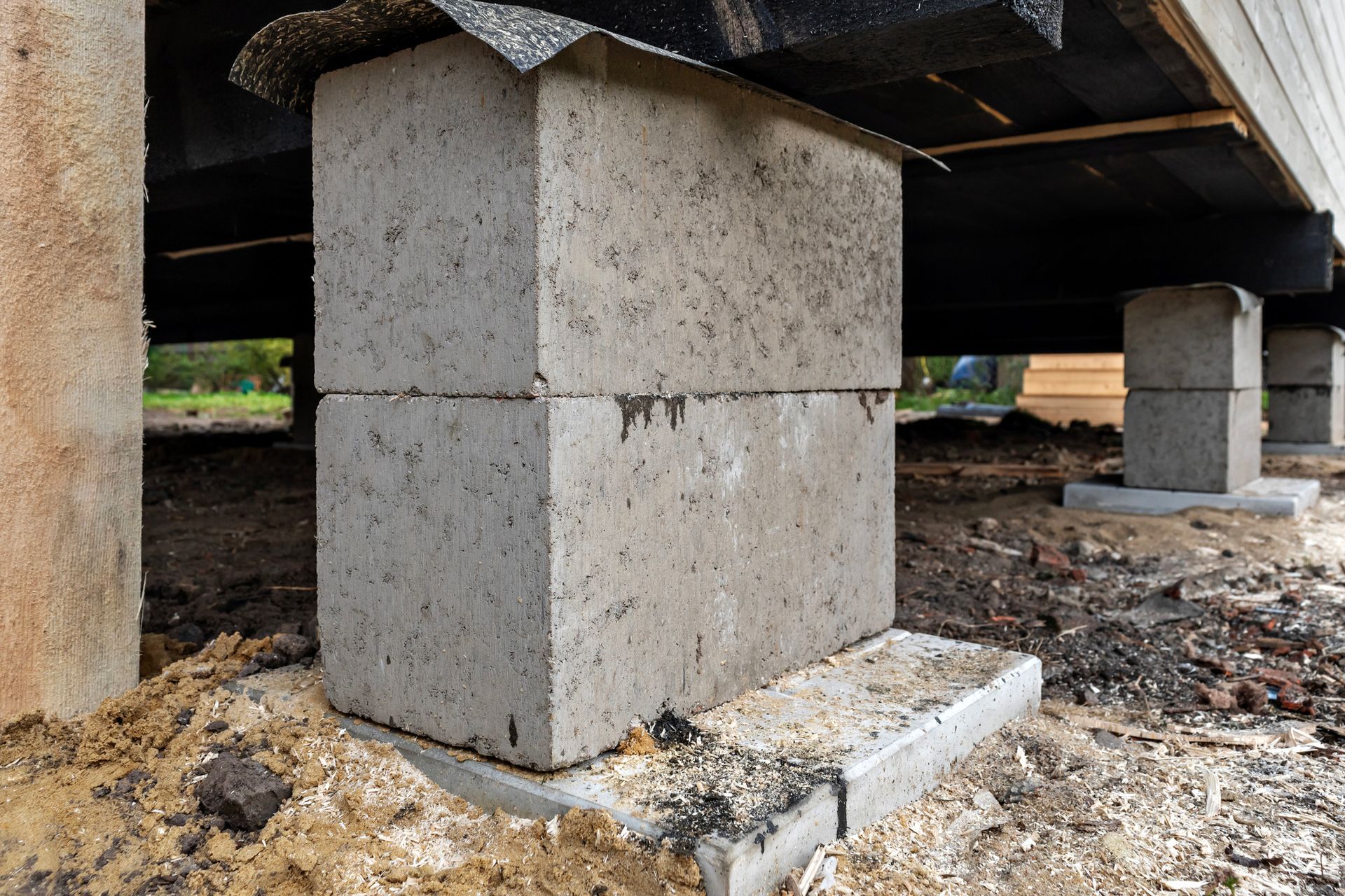 Concrete foundation blocks.