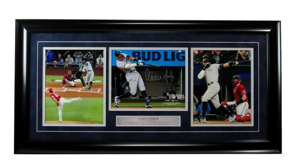 Framed baseball photos: batter swinging, game scenes, Bud Light sign, dark frame.
