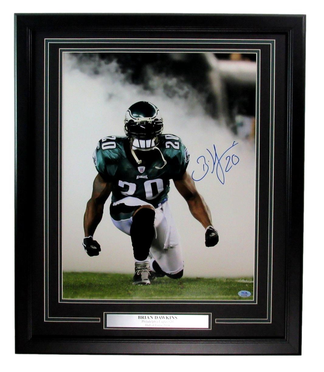 Brian Dawkins in Eagles uniform, kneeling, with signature, framed in black.