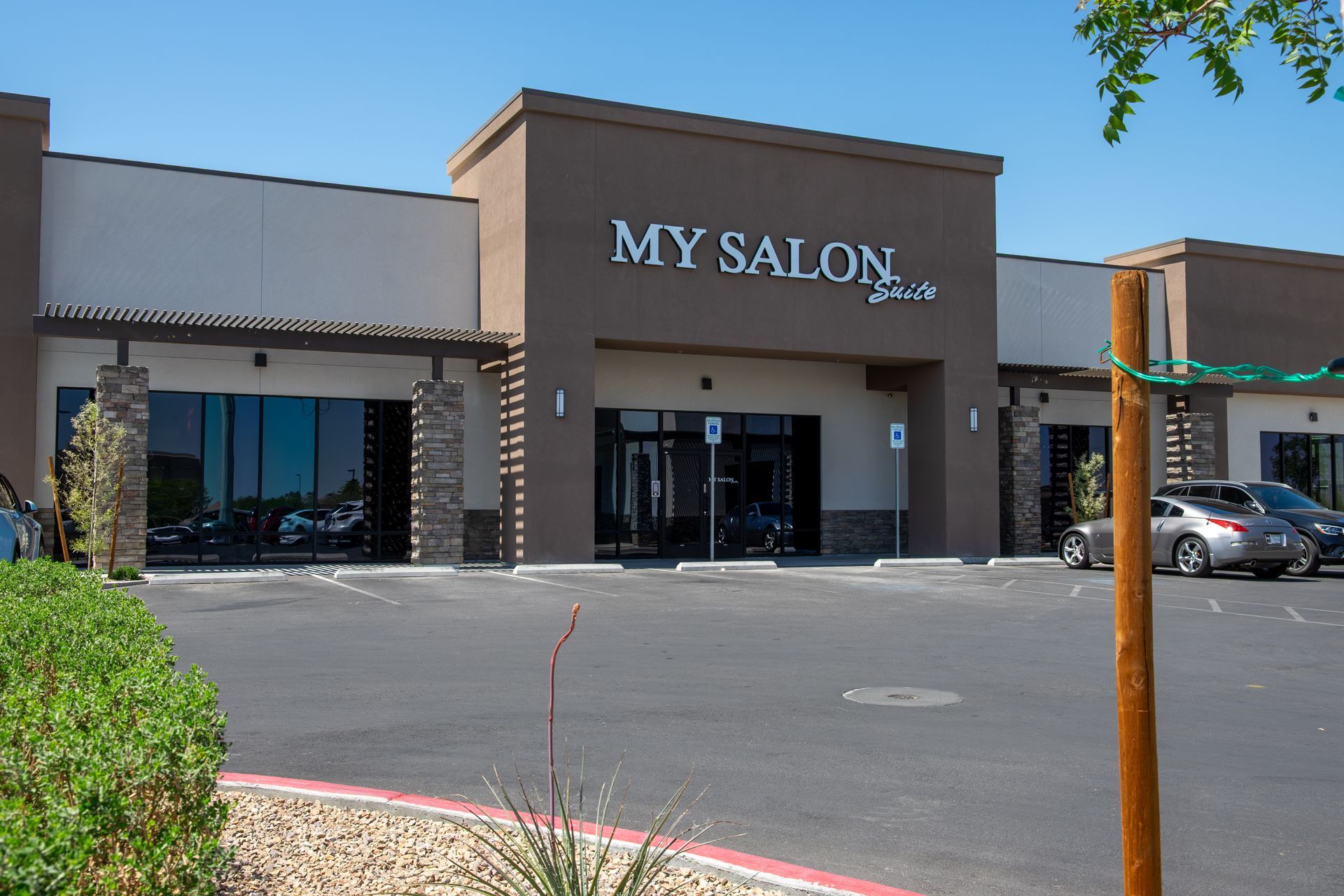 A building with a sign that says ' my salon ' on it