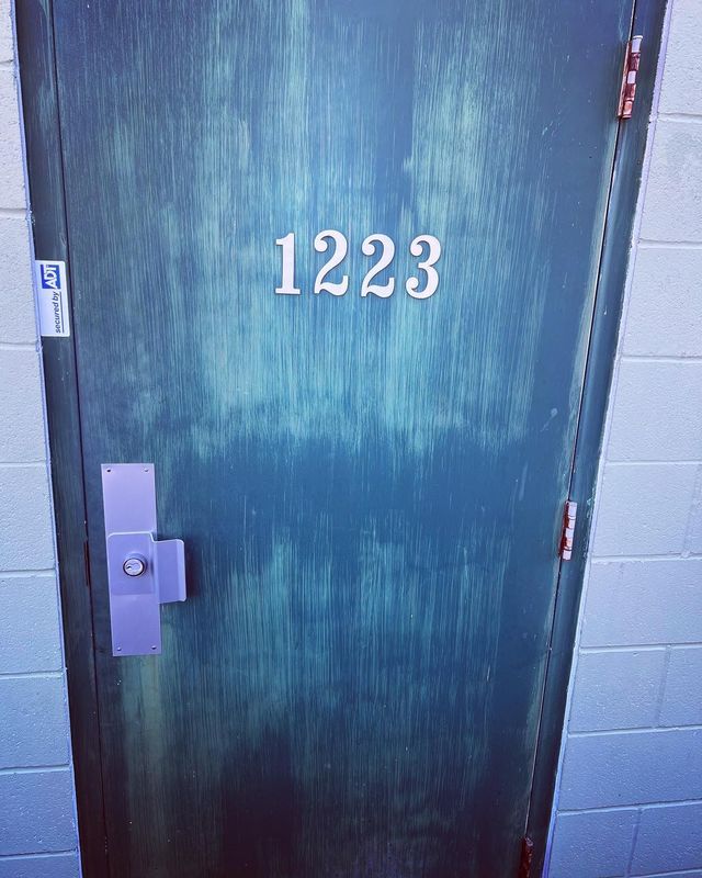 A door with the number 1223 on it