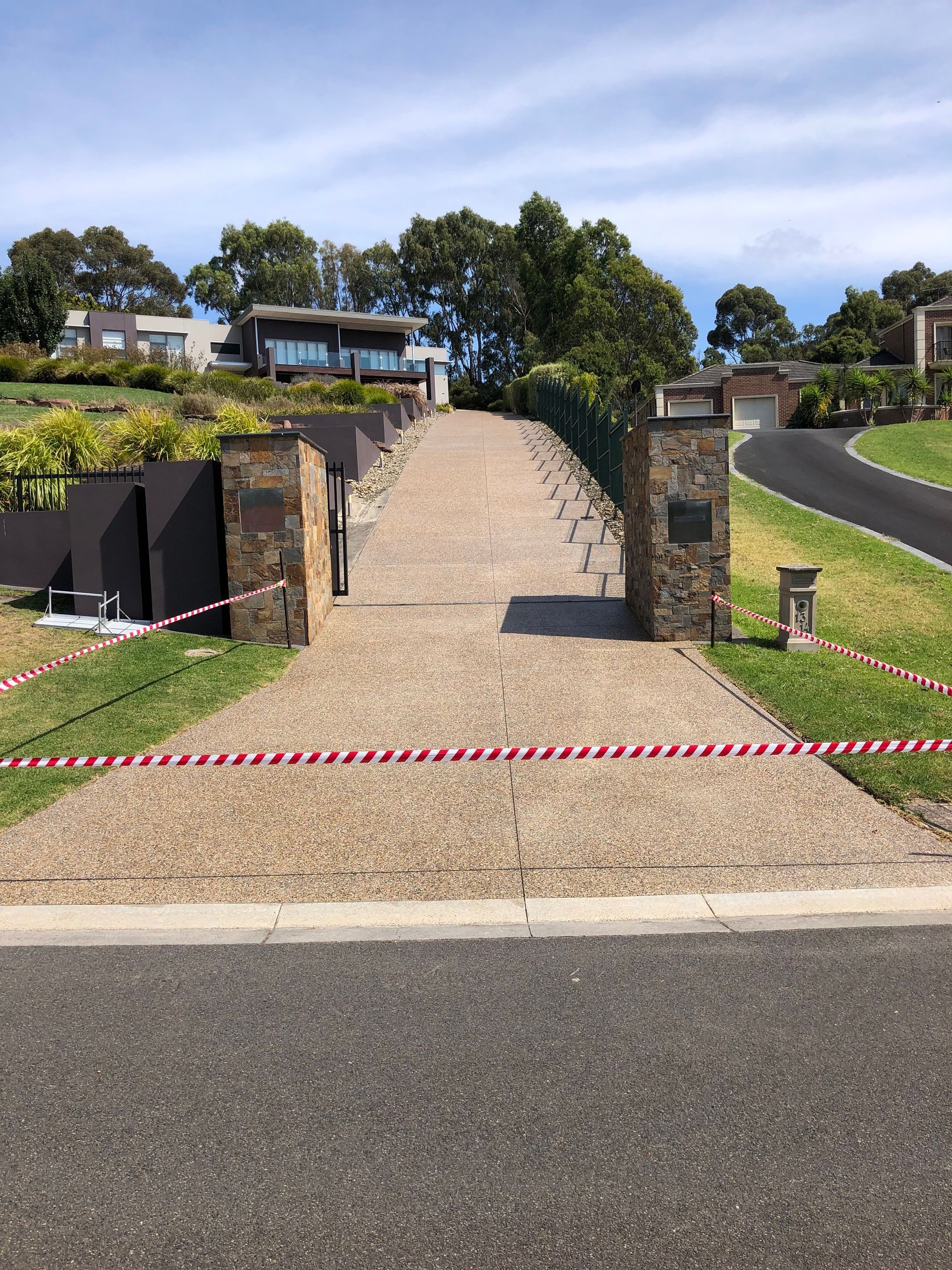 Grand Narre Warren home exposed aggregate driveway cleaned and sealed by Melbourne Concrete Sealing. MCS Refresher.