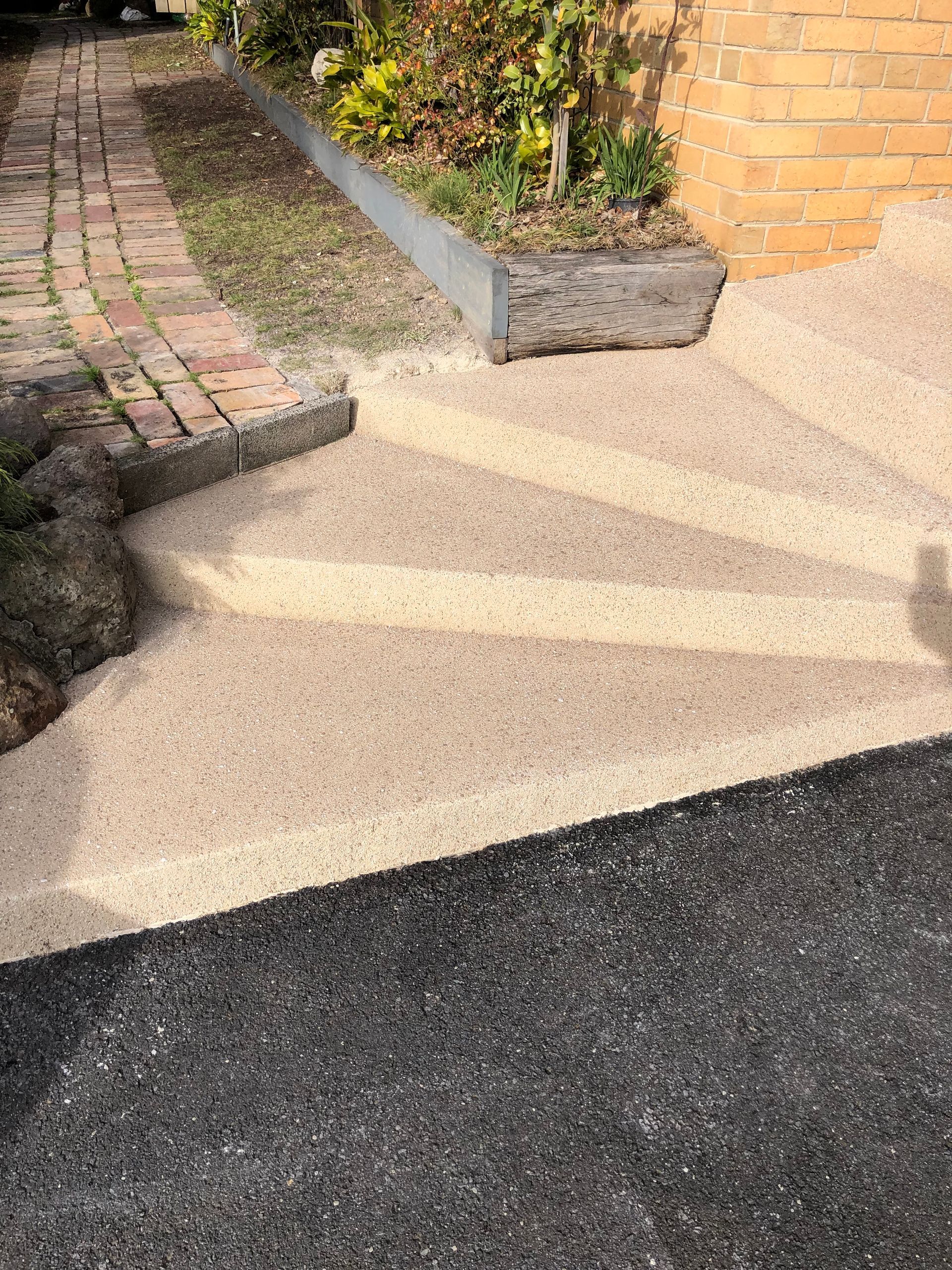 Spiral concrete staircase Resurfacing transformation with custom colour created by Melbourne Concrete Sealing and Resurfacing in Diamond Creek.