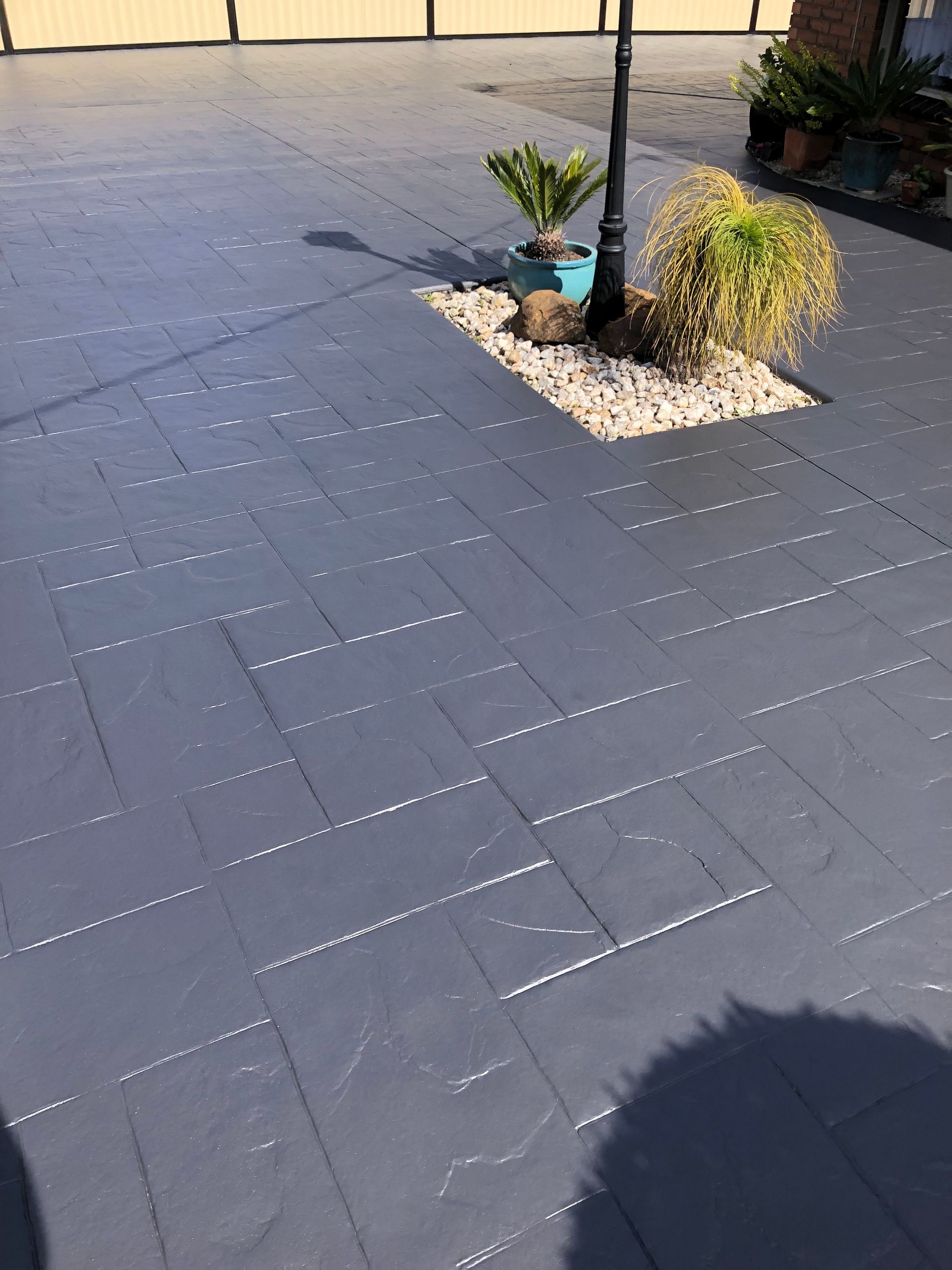 Full driveway restoration in Keilor Downs using Prime Exposure colour sealer by Melbourne Concrete Sealing.
