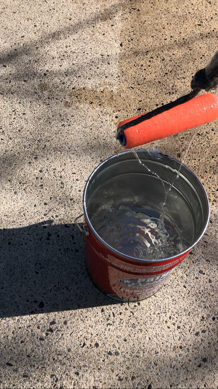 Image of driveway that's been sealed in two tone look