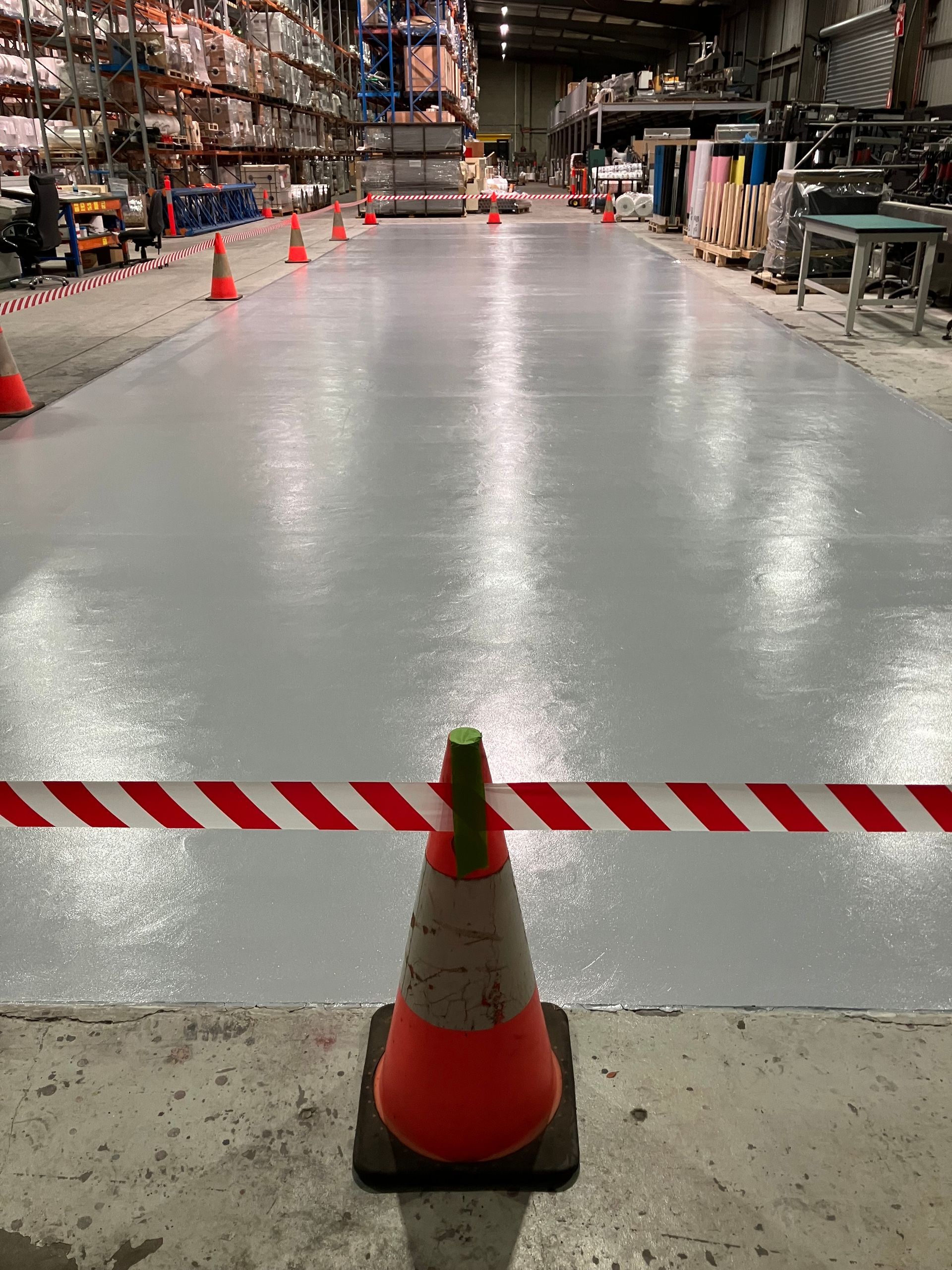 Industrial food-grade epoxy flooring for a Hallam printing factory by Melbourne Concrete Sealing and Resurfacing.
