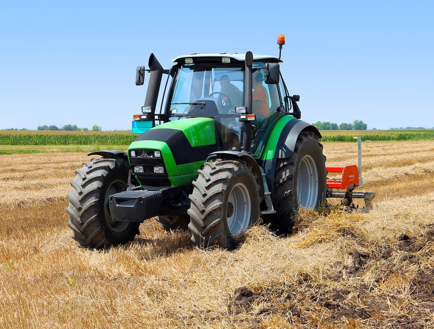 Green Tractor On The Farm — Ballina Tyrepro in Ballina, NSW