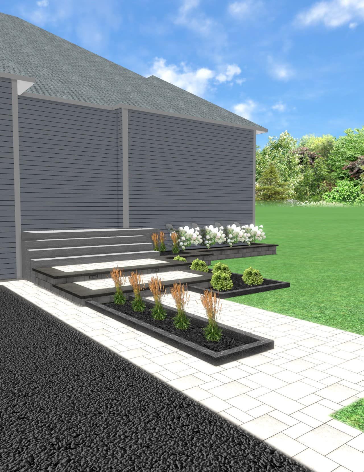 Vue extérieure d'une maison avec des marches en pierre, des jardinières noires étagées contenant des plantes et une allée en briques.