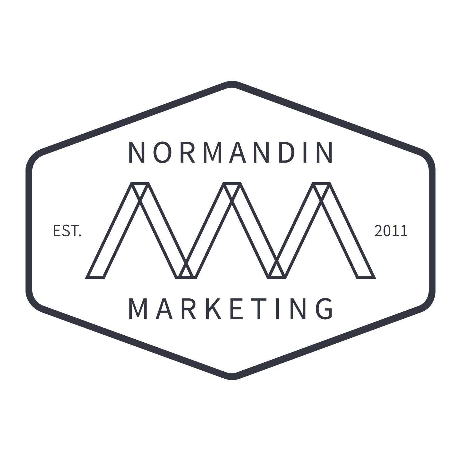 Normandin Marketing logo in black and white with hexagon outline and stylized “M” design, EST. 2011