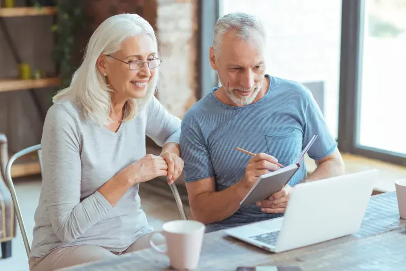 Budget financial planner assisting with IRA and 401K strategies
