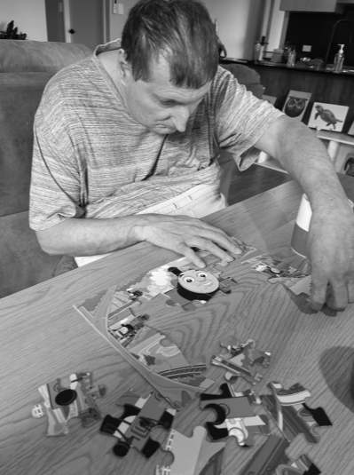Male client sitting at a table