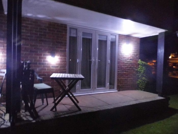 outside solar lighting on Wherry cottage patio terrace.
