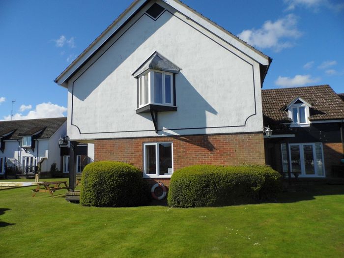 Outside of Wherry cottage, Wroxham with garden on 3 sides.