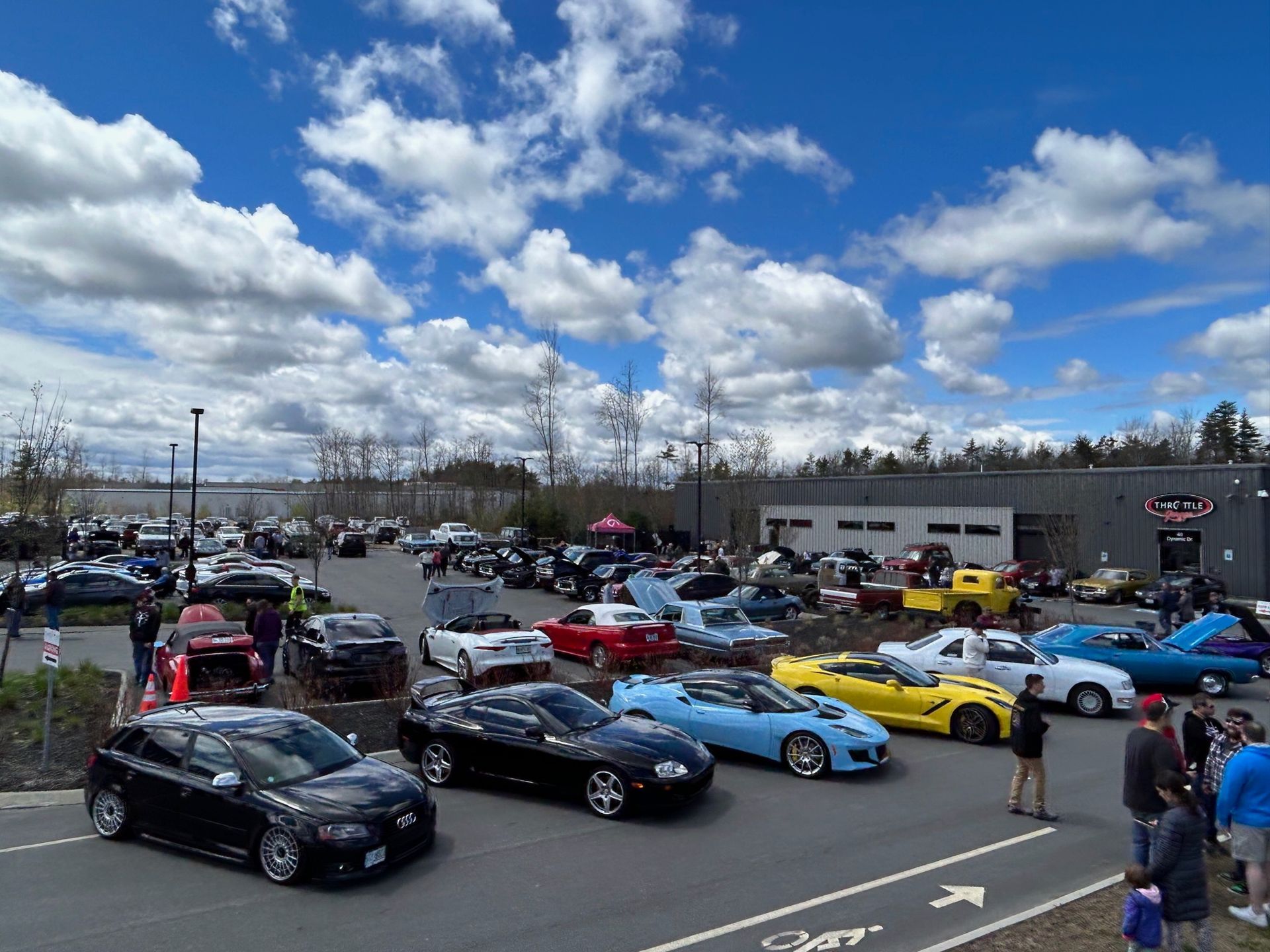 A lot of cars are parked in a parking lot