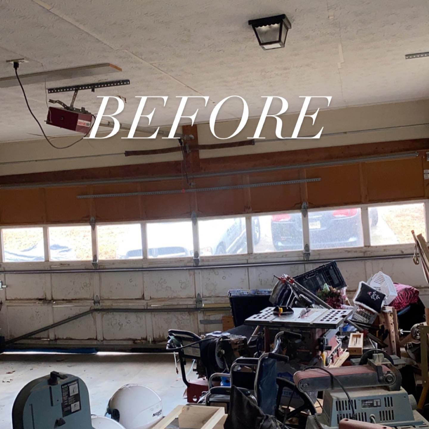 Garage before cleanup with cluttered tools and equipment piled on the right.