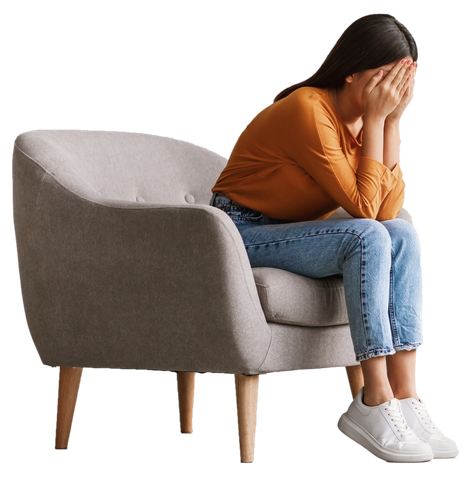 Depression Concept. Woman Sitting In Armchair feeling Stressed And Upset, Suffering Life Problems Or Mental Health Issues.