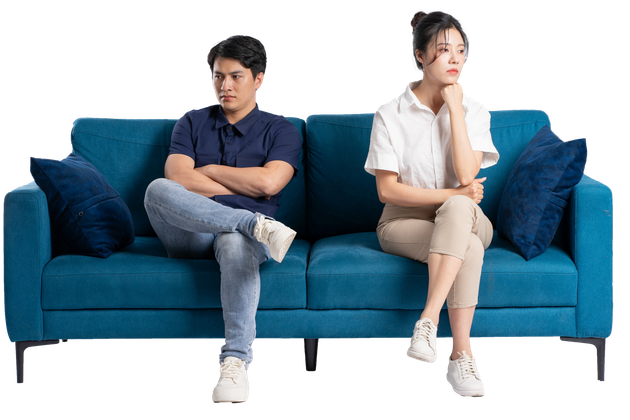 Image of an Asian couple posing on a white background.