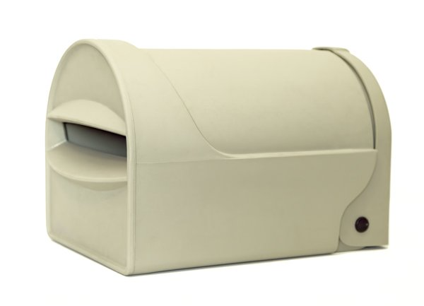 A neutral-colored, arched plastic residential mailbox with a mail slot opening on the front.