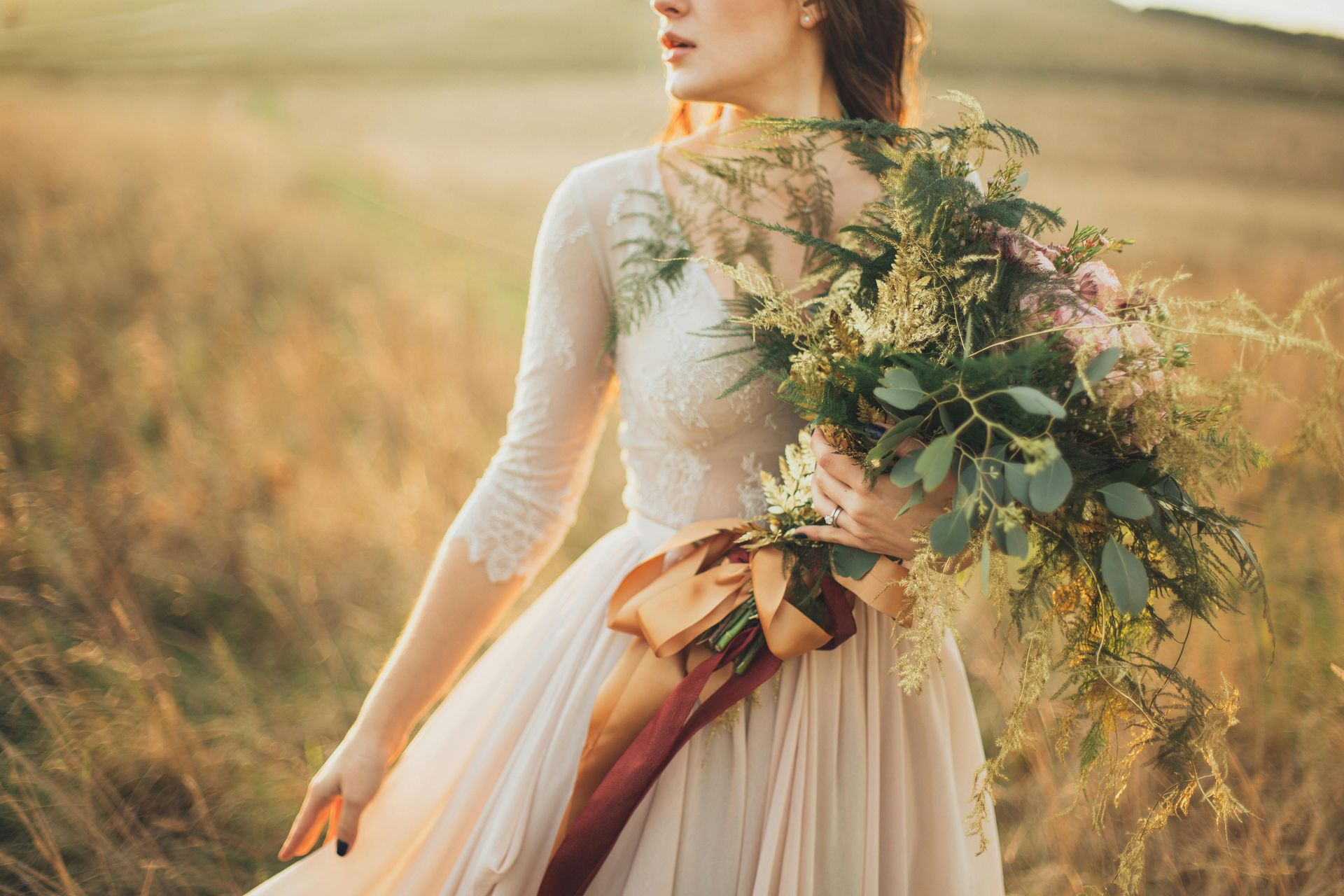 Rustic wedding venues in Arkansas with wooden barn, string lights, and scenic countryside views