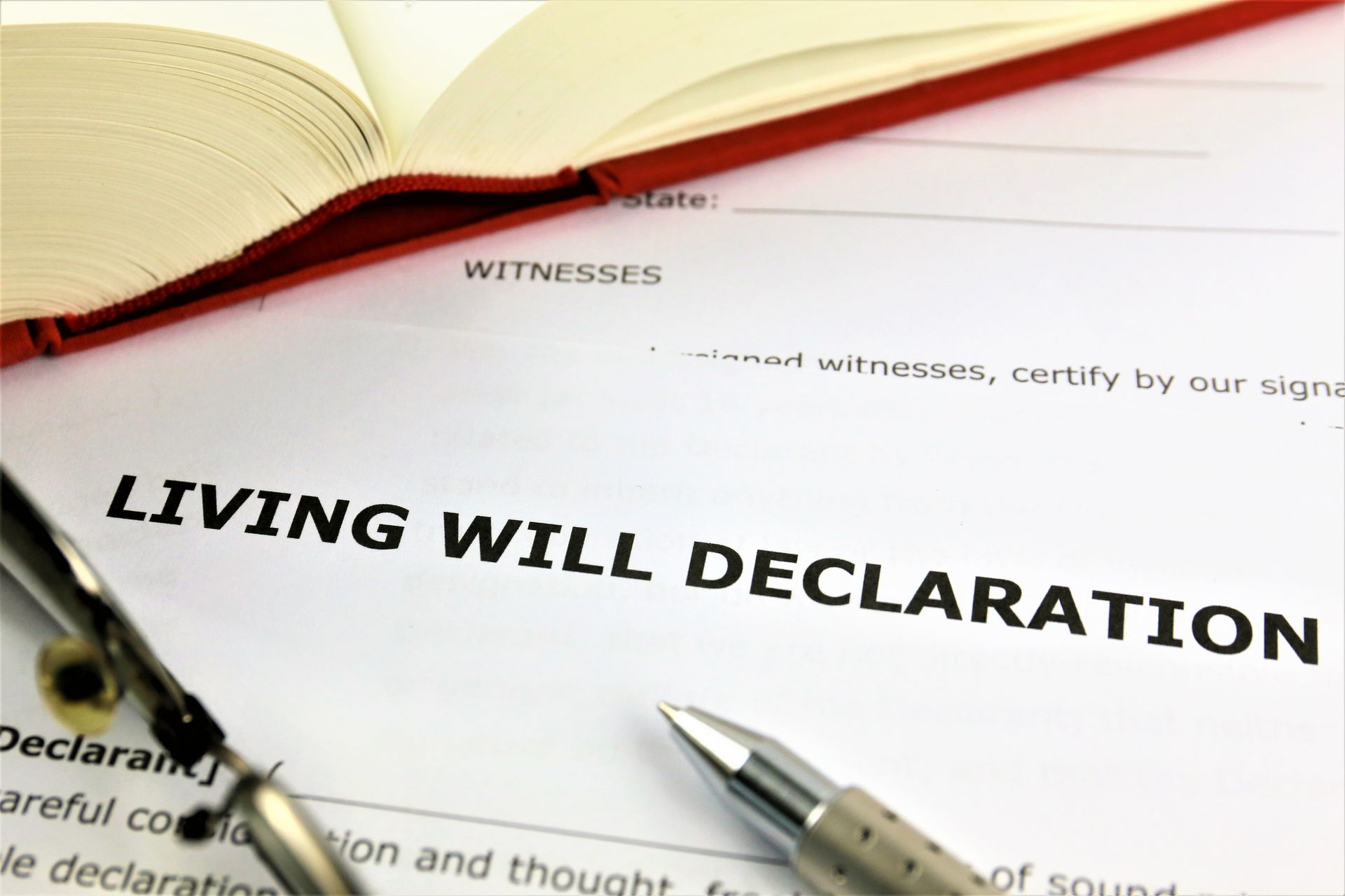 A living will declaration with a pen on top of it