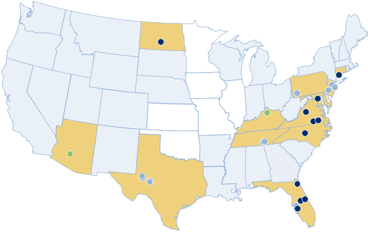 US map with highlighted states and blue dots marking service, embassy, and property locations
