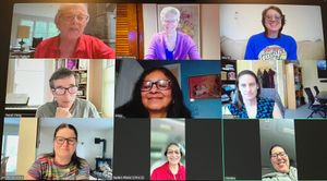 Group video call with 11 people smiling, engaged in conversation; various backgrounds including homes and offices.