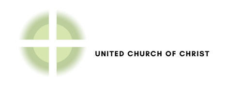 A pale green cross icon next to the black text