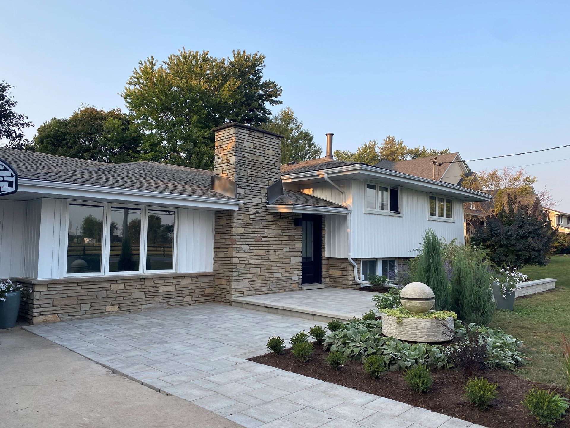 large patio with walkway by patio construction Hamilton
