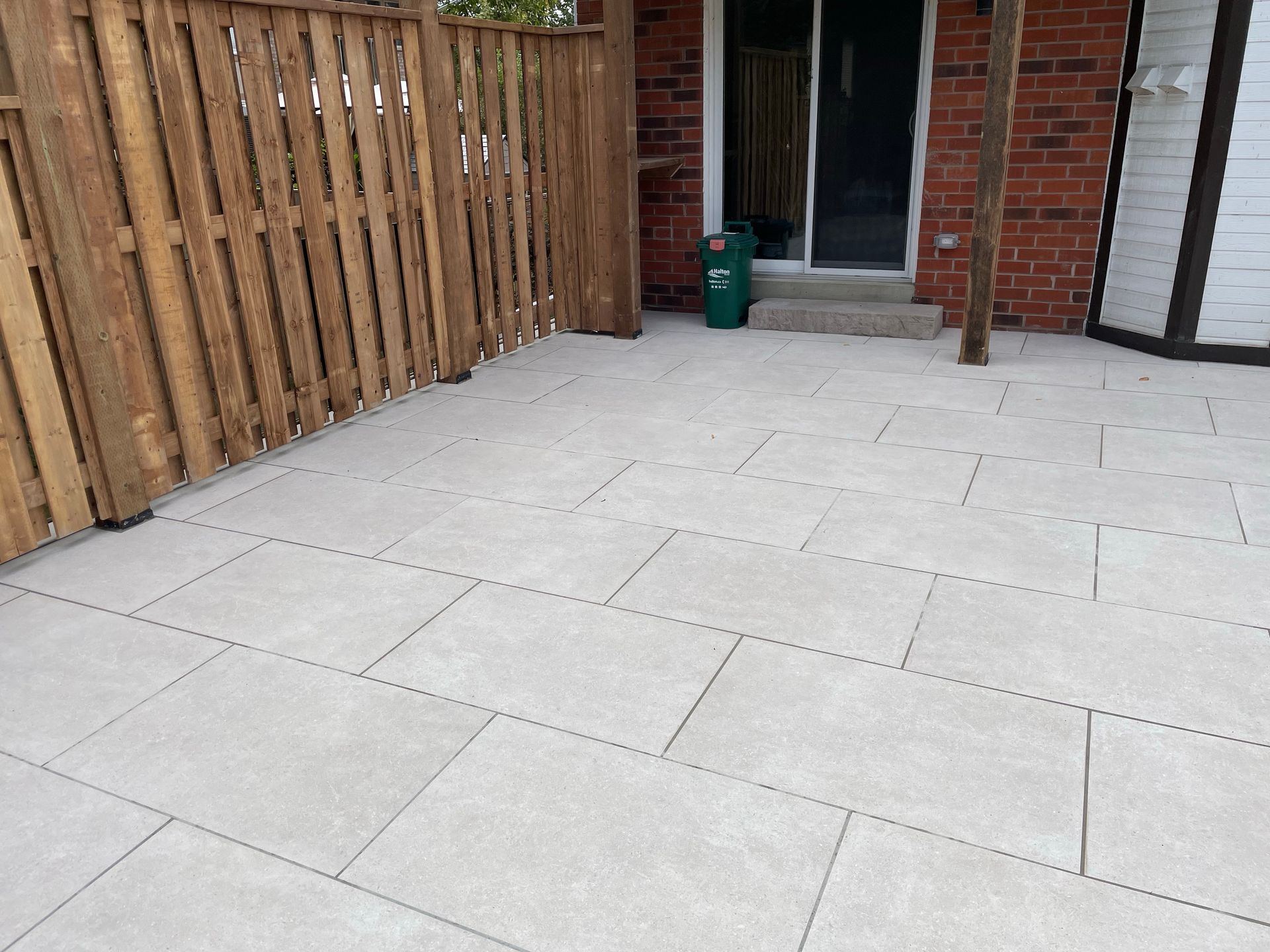 landscaped stone patio by Hamilton outdoor experts