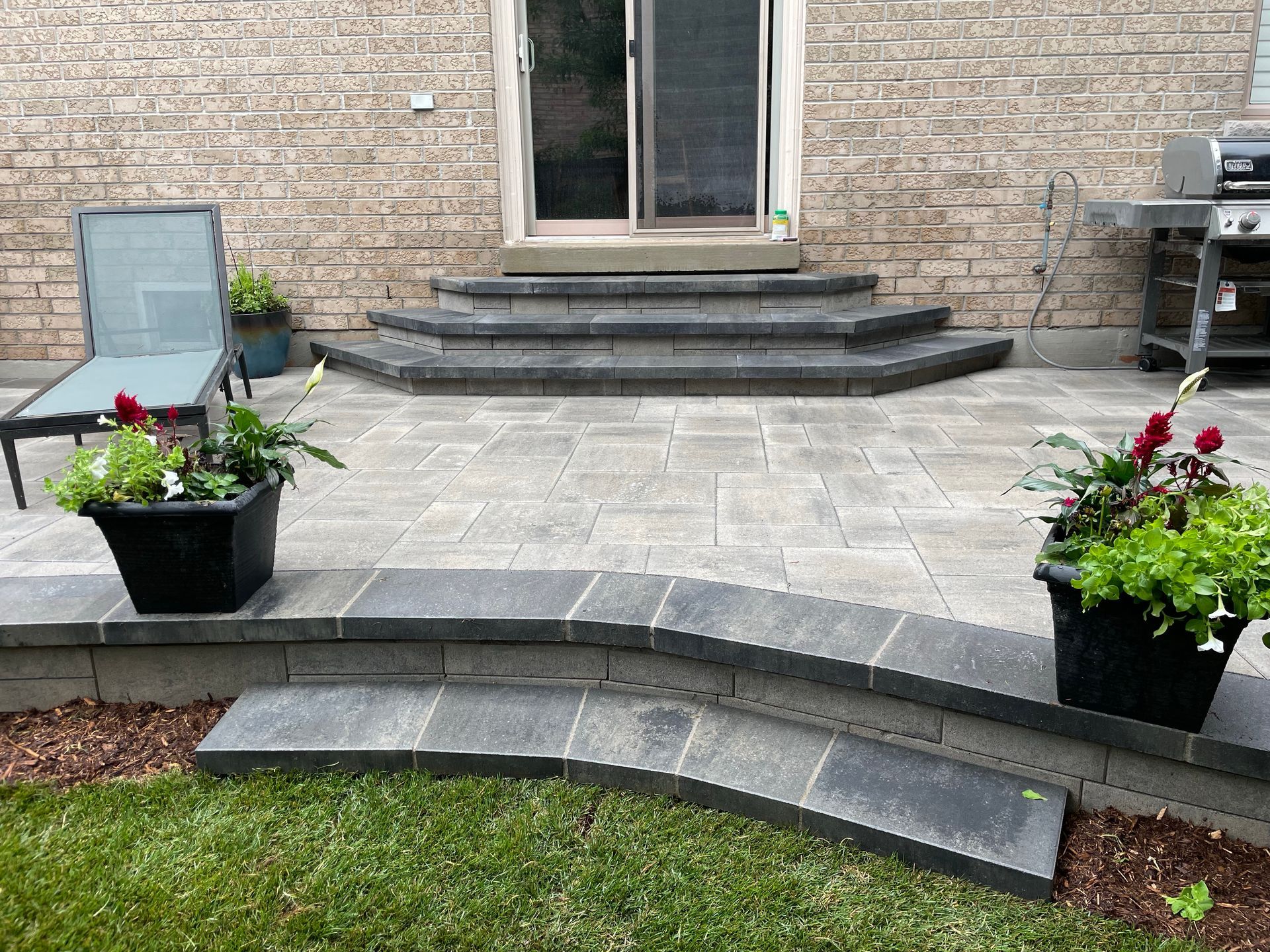large entertainment patio by patio construction Hamilton