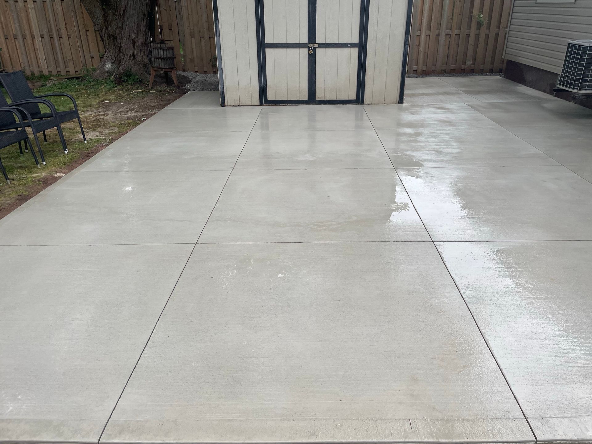 steel-reinforced patio by concrete patio installers near me