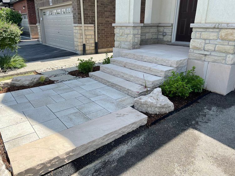 stone-topped pillars by stone mason near me
