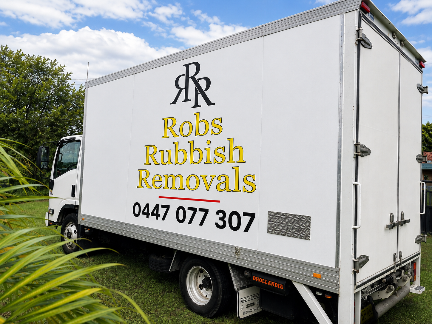 Pile of Wood is Sitting in the Middle of a Forest — Rob's Rubbish Removal in Logan, QLD