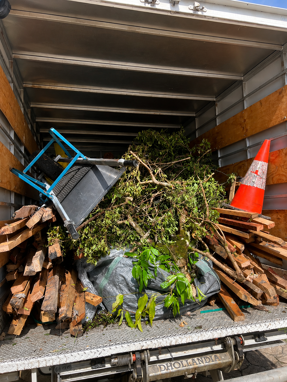 The Inside of a Moving Truck Filled With rubbsih — Rob's Rubbish Removal in Tweed Heads West, NSW