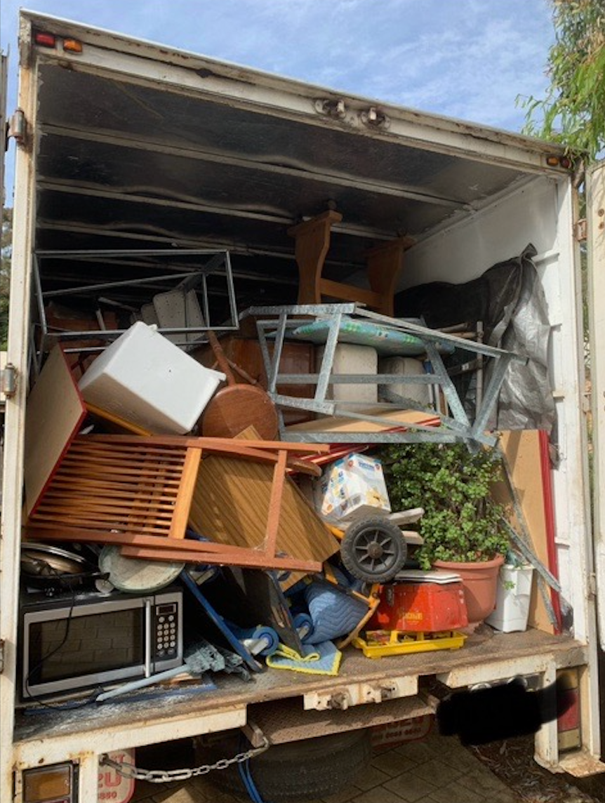 The Inside of a Moving Truck Filled With rubbsih — Rob's Rubbish Removal in Tweed Heads West, NSW