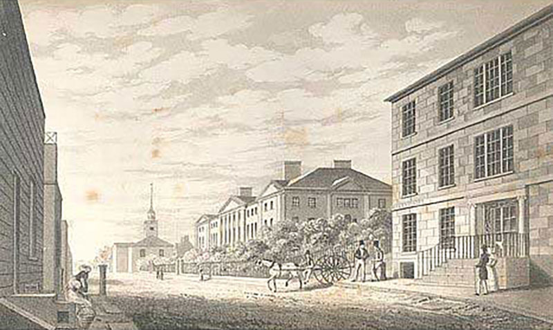Historic street scene with buildings and figures, some near a horse-drawn cart. A steeple is visible in the distance.