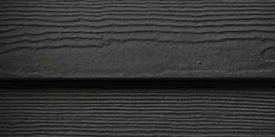 Dark gray wood siding with horizontal grooves.