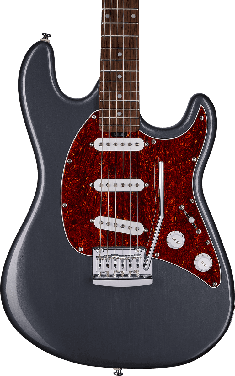 Een metallic grijze Sterling by Music Man Cutlass elektrische gitaar met een slagplaat in schildpadmotief en drie witte elementen.
