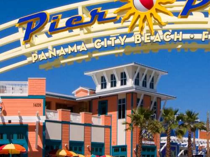 A building with a sign that says ' panama city beach ' on it