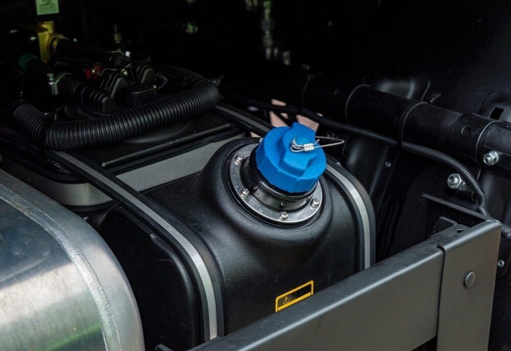 A Close Up of a Fuel Tank With a Blue Cap on It — Fosters Ace Auto Repairs In Aitkenvale, QLD