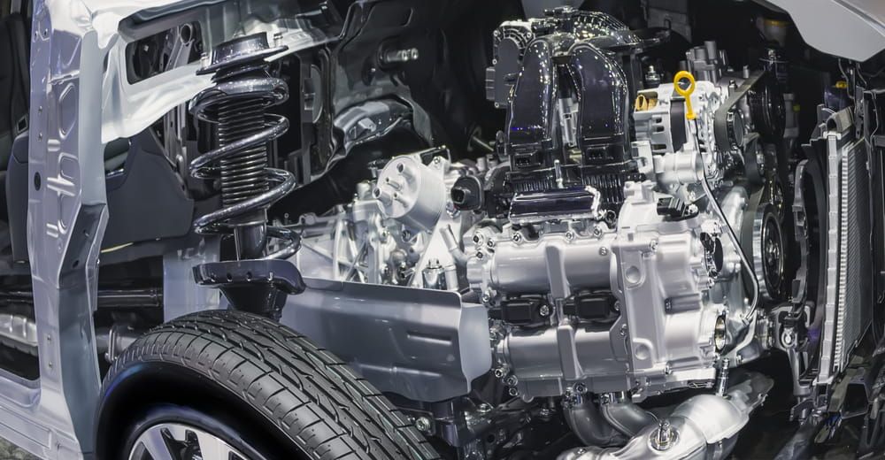 A Close Up of a Car Engine With the Hood Open — Fosters Ace Auto Repairs In Aitkenvale, QLD